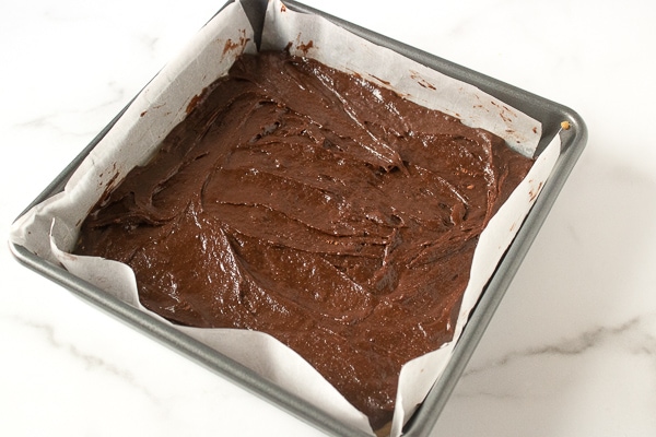 Chocolate peanut butter brownie mix in baking pan