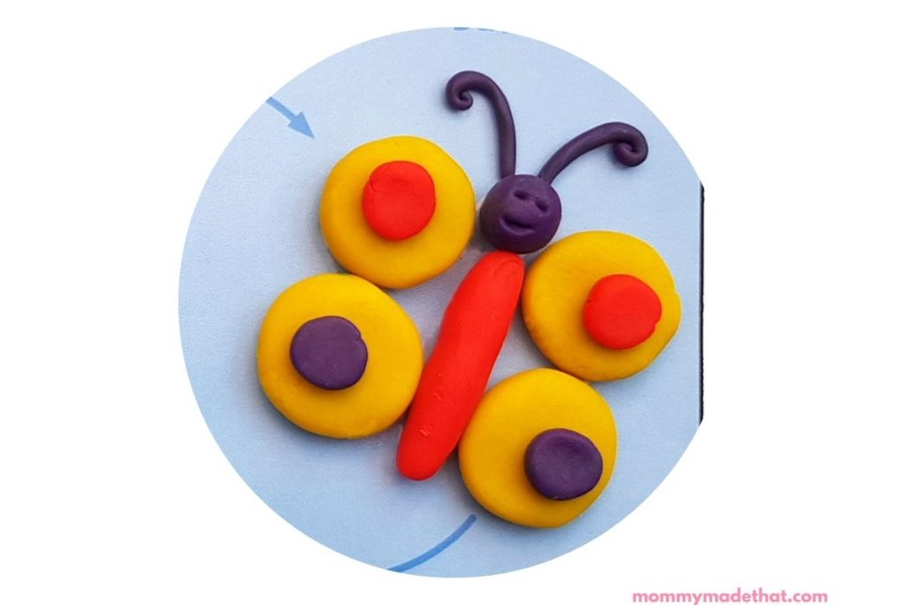 butterfly stage of butterfly life cycle demonstrated on printable mat with play doh