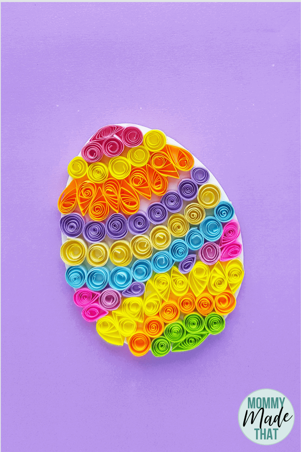 Quilled Easter egg craft. Fun paper easter egg craft you can do by yourself or with your kids! Made of colorful strips of paper.