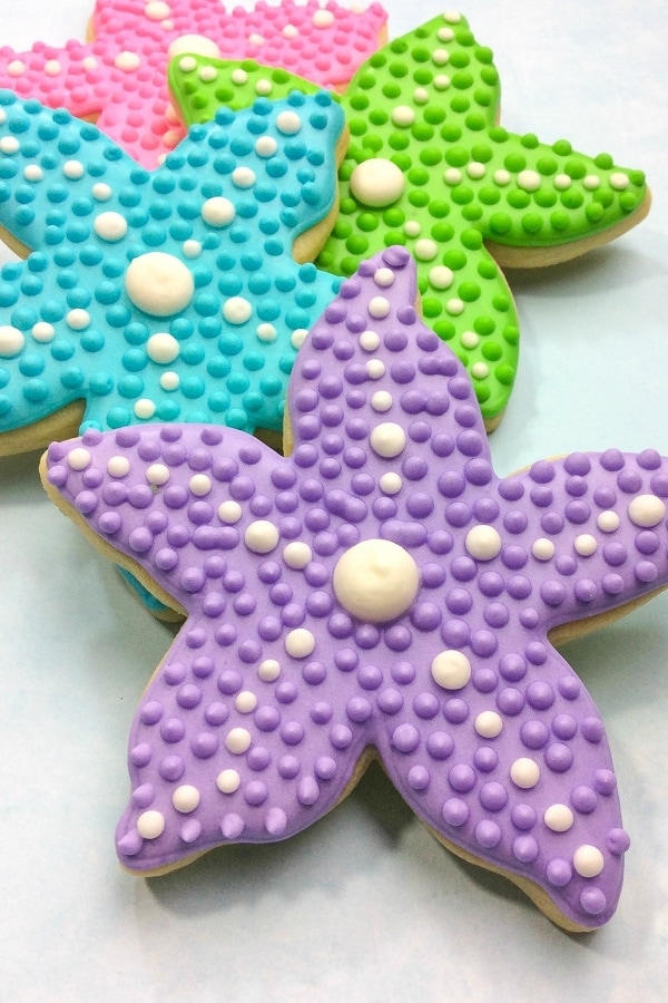 colorful starfish mermaid cookies with royal icing